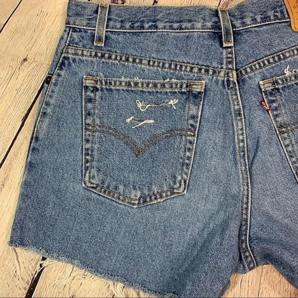 Vintage High Waisted Levi’s Distressed Jean Short - Picture 5 of 9